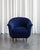 The armchairs were reupholstered in dark blue high-quality fabric. They come from the 1940s and their blossoming tulip...