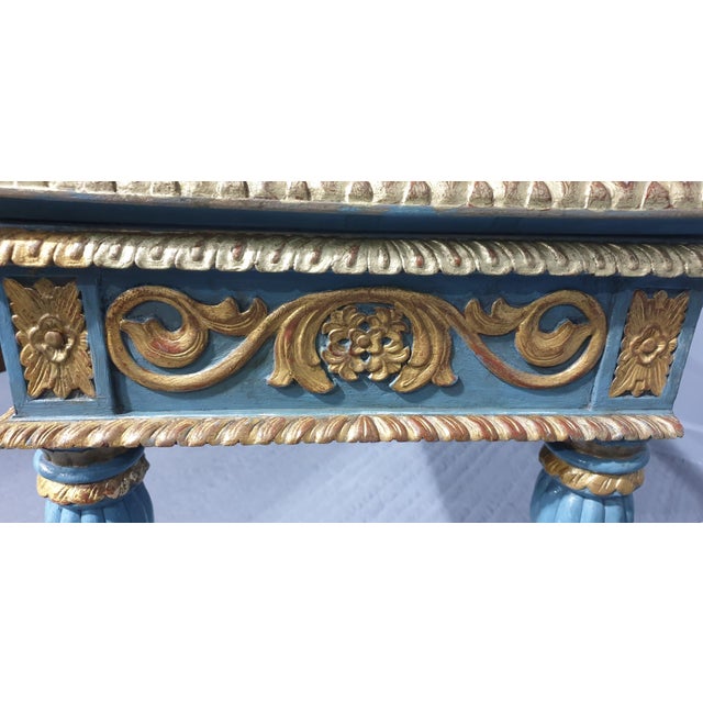 A very good large blue and parcel gilded hall console table,very crisp carvings, in great condition. 32.5" high 64.75"...
