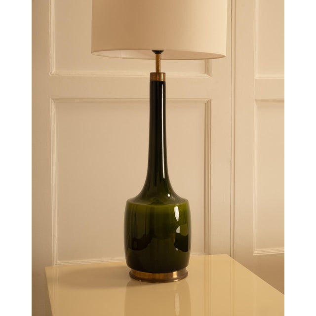 Lamp attributed to svend age holm sorensen - denmark, 1960s crafted in olive green glass with delicate brass details on...
