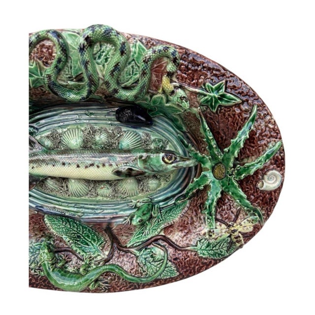 19th Century Majolica Palissy Pike Wall Platter. On a brown background, a pike on the center , the border os decorated...