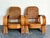 This elegant pair of vintage bent rattan lounge chairs beautifully embodies the organic design sensibilities of the...