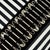 This pillow features Punk Rock Mix Tape by Johnson Hartig/Libertine for Schumacher with a knife edge finish. Sid Vicious...
