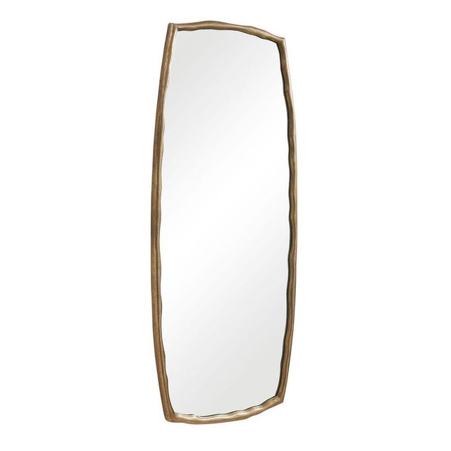 This unique tall mirror features a striking, organic cast aluminum frame with subtle pitted texture and undulating edges,...