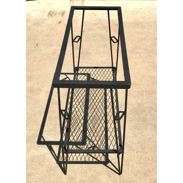 Nice vintage black iron plant stand or table. Needs a glass top. Comes apart for shipping