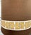 Ornate ceramic lamp with drapery detail, and custom sienna linen shade by Michael Savoia