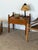Danish pair of nightstands in solid oak, attributed to Henning Kjærnulf, 1960s. Each stand has a raised gallery rail along...
