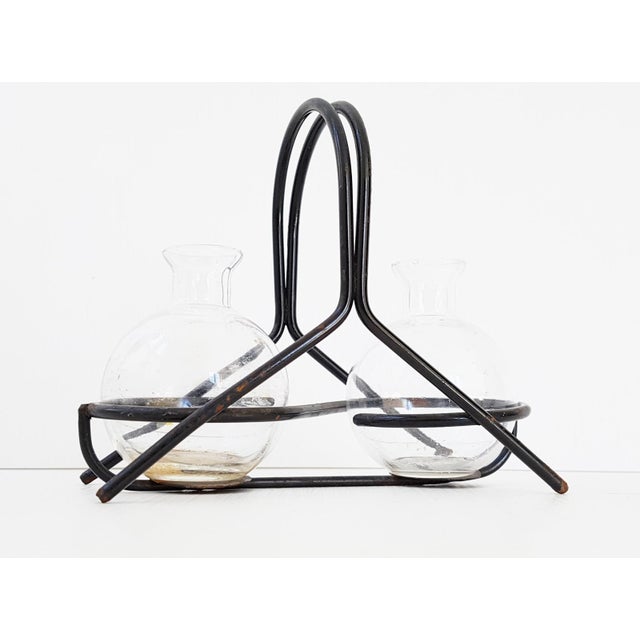 Fair condition. Metal warping and oxidation. Glass in good condition but needs cleaning. Stoppers not included. Reference:...