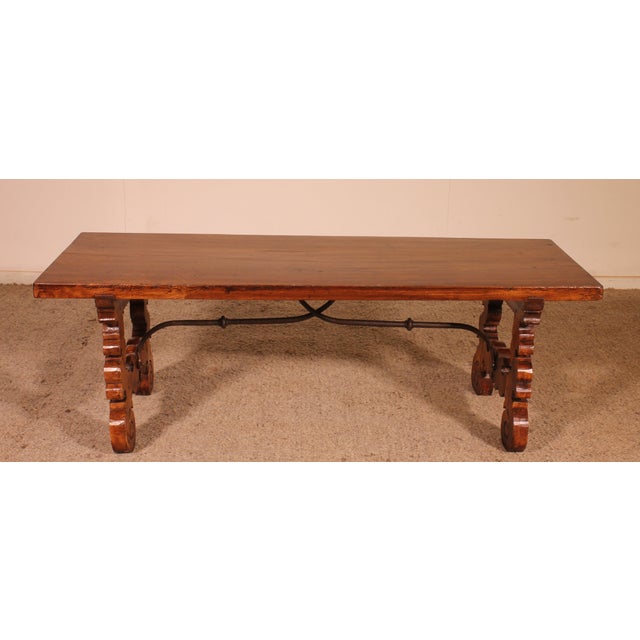 Lovely Renaissance-style Spanish walnut coffee table Unusual coffee table featuring a beautiful 17th-century walnut top...
