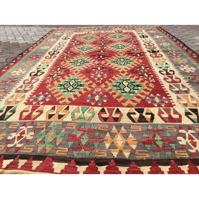 This beautiful, vintage, handwoven Kilim is approximately 60 years old. It is handmade of very fine quality, hand-spun...