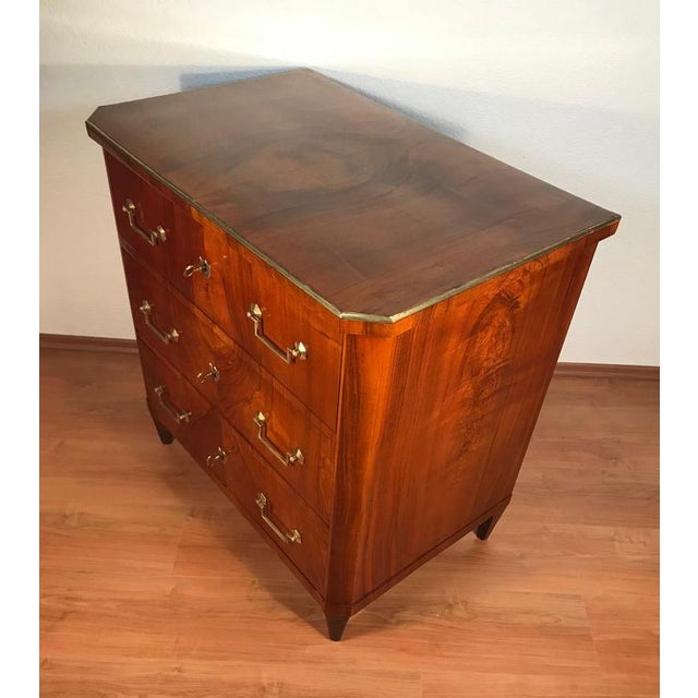 this elegant biedermeier walnut chest of drawers dates to circa 1810–1820. Its restrained design and beautifully figured...