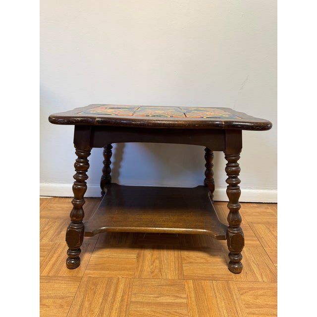 A stunning example of California's golden age of decorative arts, this hand-crafted tile-top side table dates to the...