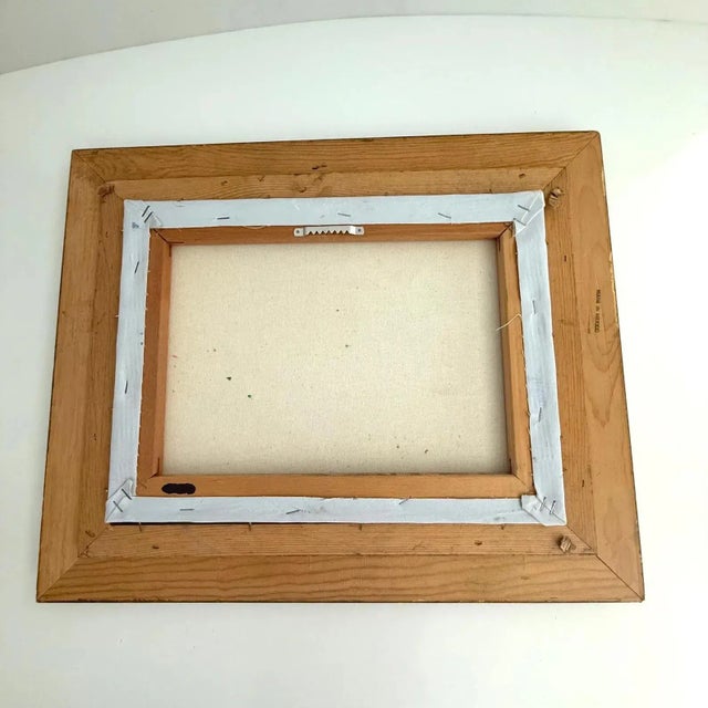 The vibrant blue sea, inviting patio, and lush greenery transports one to another place. This coastal scene is unsigned....