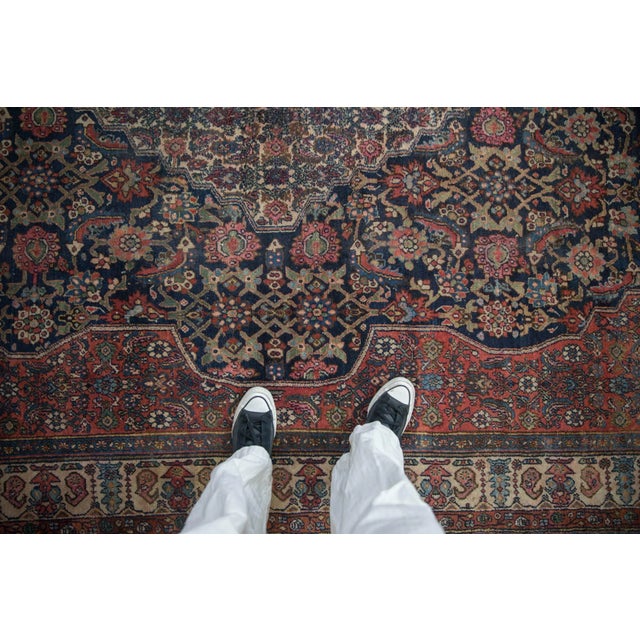 :: Diamond shaped center medallion with small scale Herati design motif atop a large scale inverted coloration Herati...