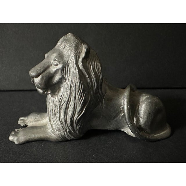 Vintage Rawcliffe solid pewter resting lion figurine. Made in the USA. Approximately 2 1/2” long. Weighs 6.3 ounces.