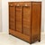 Triple-shutter filing cabinet Made of oak Early 1900s Dimensions: width 142 cm, depth 45 cm, height 132 cm Restored (see...