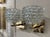 Elegant pair of modern "Rosti" Murano glass and brass sconces. Featuring beautiful glistening glass that gives a lovely...