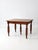 Antique wood dining table with beautifully carved balustrade legs, showcasing the craftsmanship and character of a classic...