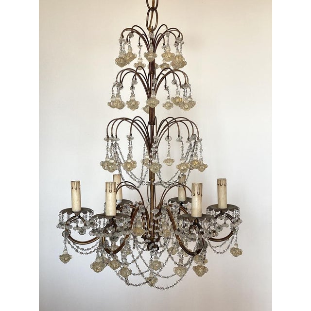 1960s chandelier, golden metal structure with Murano glass drops and pendants Up to 250V (Europe/UK Standard).The wiring...