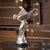 A 20th Century English silver plated model of the legendary Rolls-Royce mascot which was designed by Charles Sykes, this...