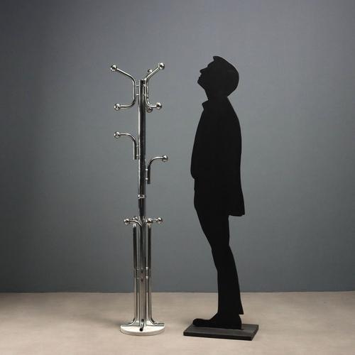 Vintage coat rack in chromed metal and marble base. This piece is attributed to the mentioned designer/maker. It has no...
