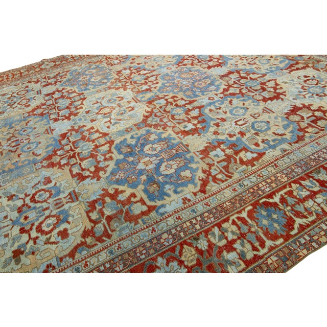 1920s Handmade Persian Bakhtiari Red Wool Rug Featuring an Allover Floral Pattern For Sale - Image 5 of 9