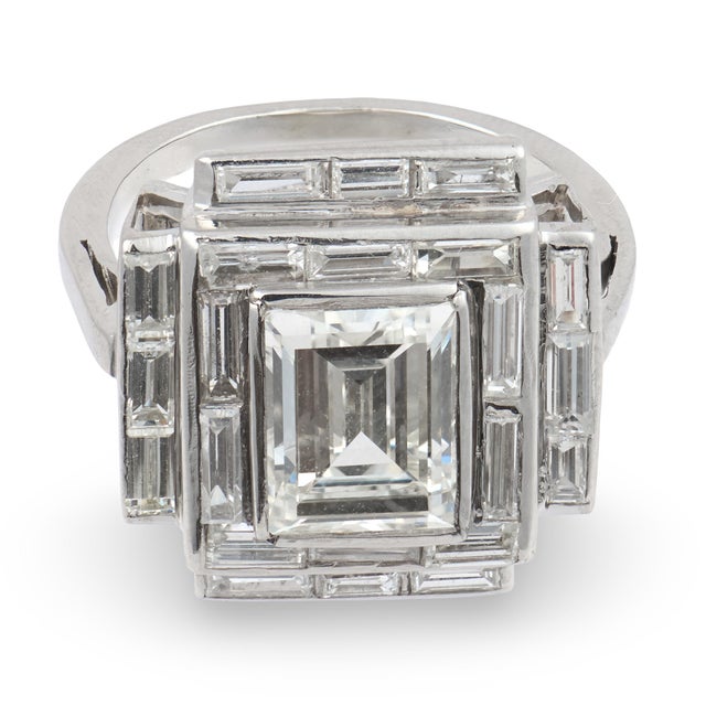 A commanding example of 1950s glamour, this Mid Century platinum cocktail ring showcases a breathtaking 2.72 carat emerald...
