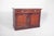 English-style tall sideboard. With two top drawers, each with a yellow metal handle. Below, two doors with recessed ogival...