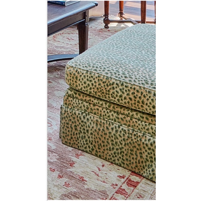 This is a beautifully tailored custom ottoman upholstered in iconic Cowtan & Tout Ocelot fabric, one of the deign world's...