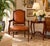 Elegant vintage Louis XVI-style armchair, made in Spain, featuring a finely carved wood frame with fluted legs, carved...