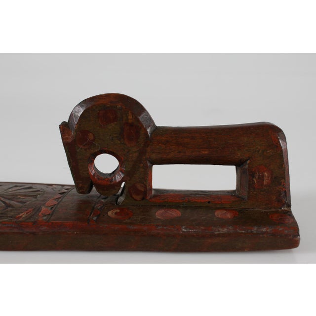 Small size version of a Danish mangle board (clothing and bedding press) dated from ca. 1750-1800. Made of wood richly...