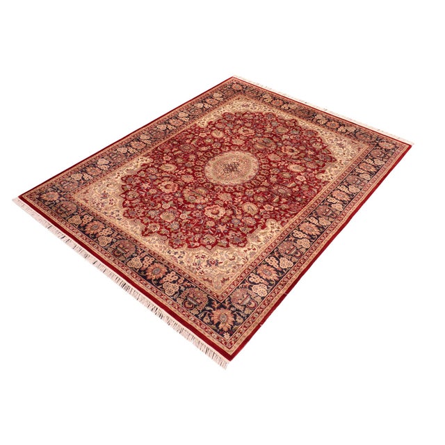 Designed with mesmerizing intricacy and gorgeous color palette, this hand-knotted masterpiece demonstrates the beauty and...