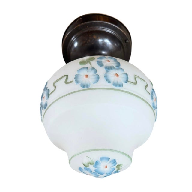 This rare flushmount ceiling light fixture will look great with any style of architecture. The frosted white shade is...