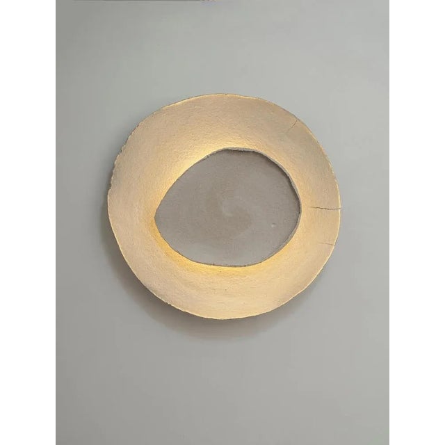 Bone #18 wall light by margaux leycuras. One of a kind, signed and numbered. Dimensions: ø56 cm. Material: ceramic, sand...