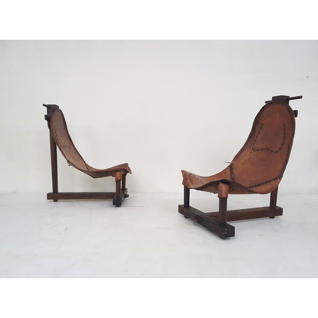 About this item Solid wooden frames and saddle leather seating.