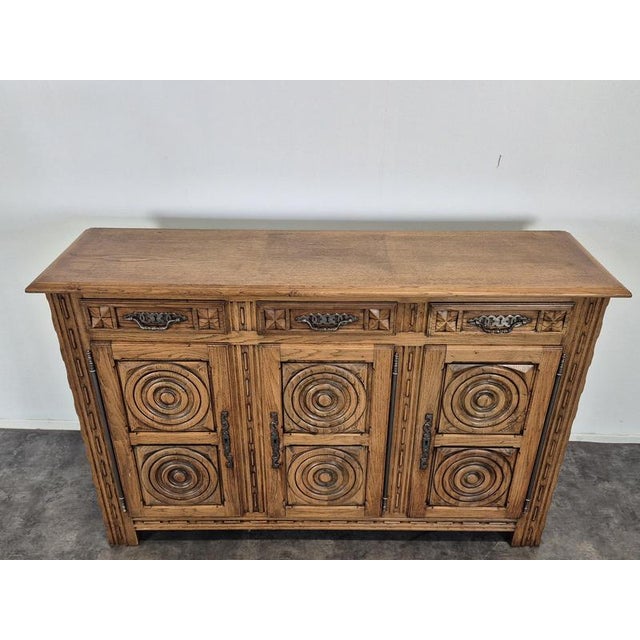 High Sideboard in Carved Oak from DLG ​​dudouyt, in Very Good conditions.