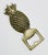 Vintage Hollywood Regency style brass pineapple motif bottle opener. Great detail. Patina.