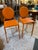 Design Plus Gallery presents a Pair of Orange Isabelle Counter Stools from Euro Style. The Isabella Bar Stool wraps...