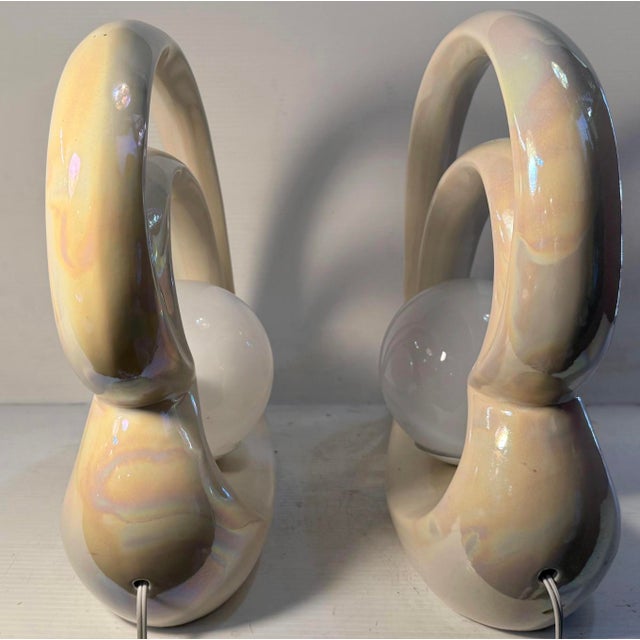 These heart shaped lamps in the Art Deco style provide both soft light and taste to any space. With a pearlescent finish...