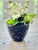This substantial ceramic flower pot features the iconic "Blue Agate" cobalt spongeware glaze, handcrafted by Bennington...