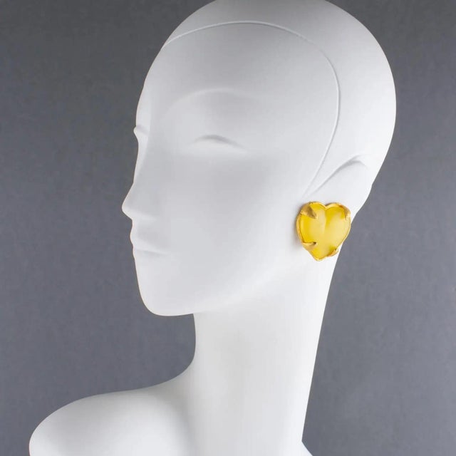 Edouard Rambaud Paris designed those stunning heart clip-on earrings. The raised heart shape features a gilded metal...