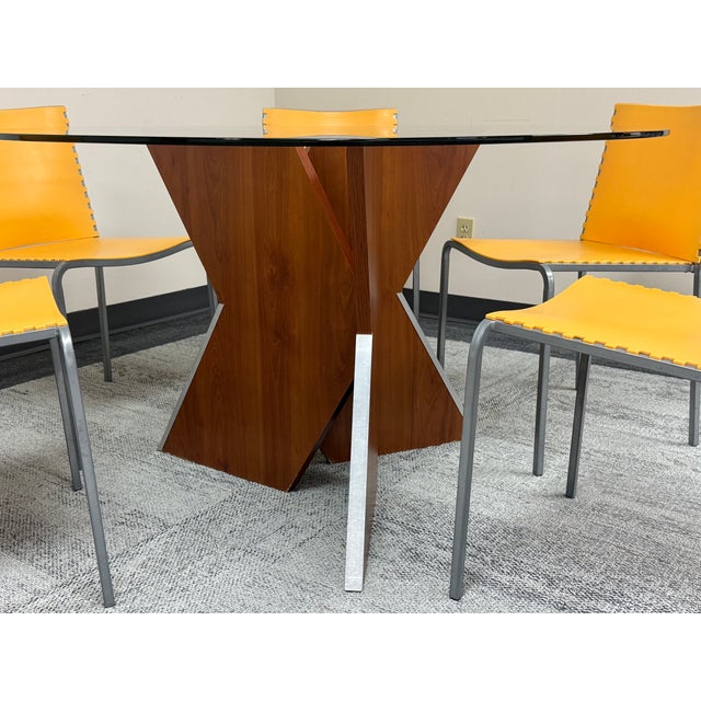MODERN GLASS TOP DINING TABLE WITH 6-CHAIRS -MANUFACTURE: Unknown -IN THE STYLE OF: Boho -DATE OF MANUFACTURE: Unknown...