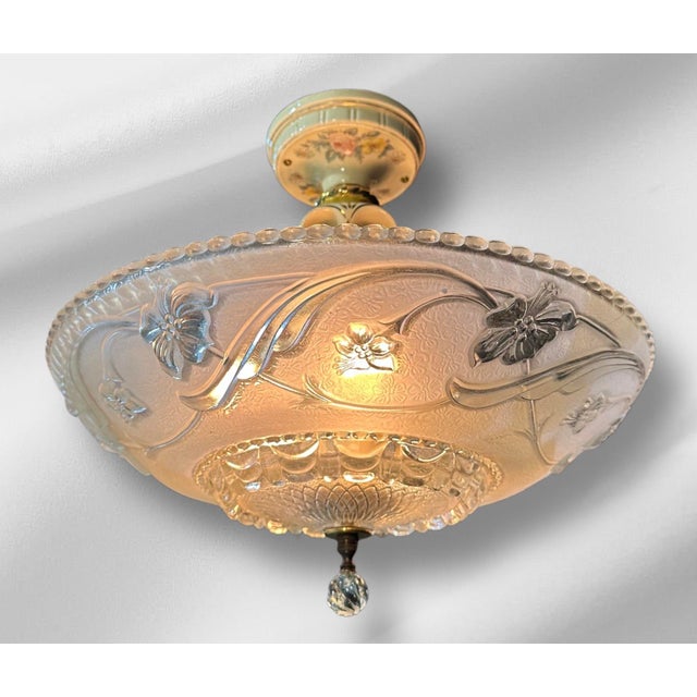 This piece is quite a historical find! All pieces are fully original, including the finial. The creme colored porcelain is...