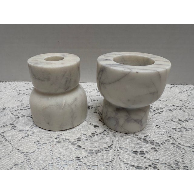 Timeless, elegant, white and gray alabaster candleholders. What makes these interesting and unique is that one side can...