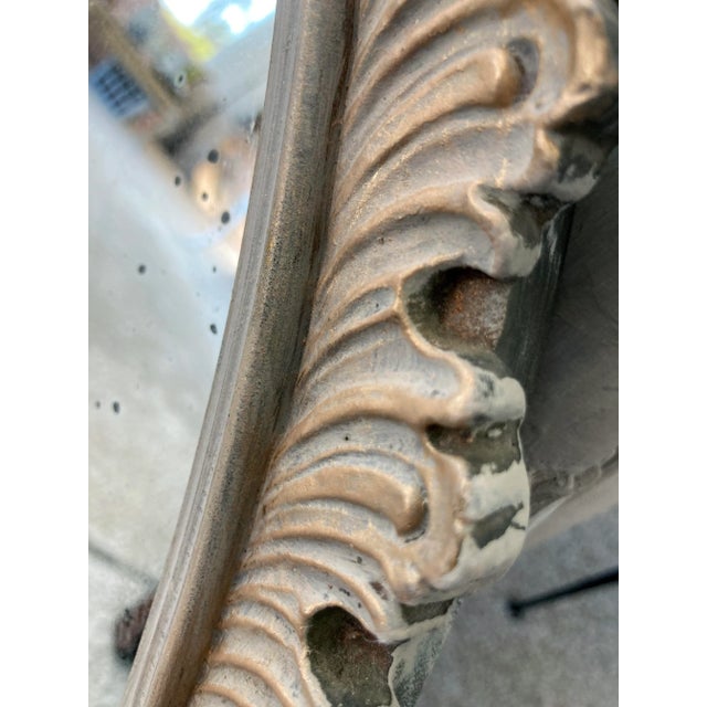 A stunning Art Deco-style mirror featuring the original glass. The swirl motif frame is hand painted in a natural...