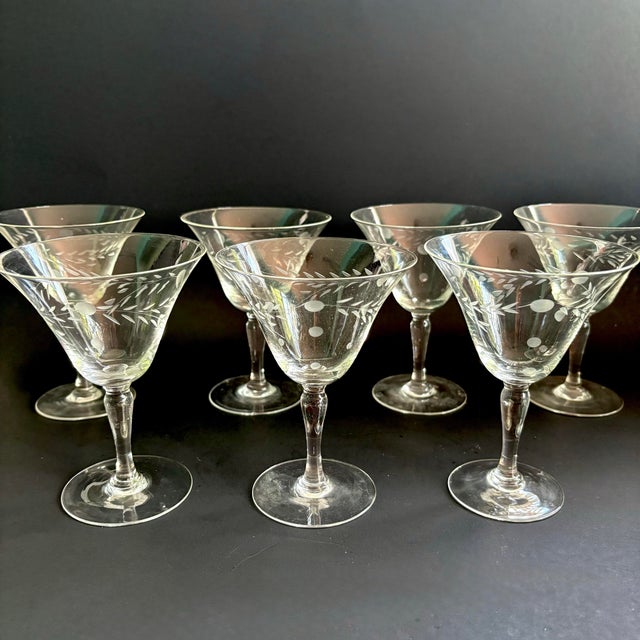 A refined set of 7 midcentury chapagne / tall sherbet glasses in the Willow Moon pattern by Pioneer, Japan, showcasing...