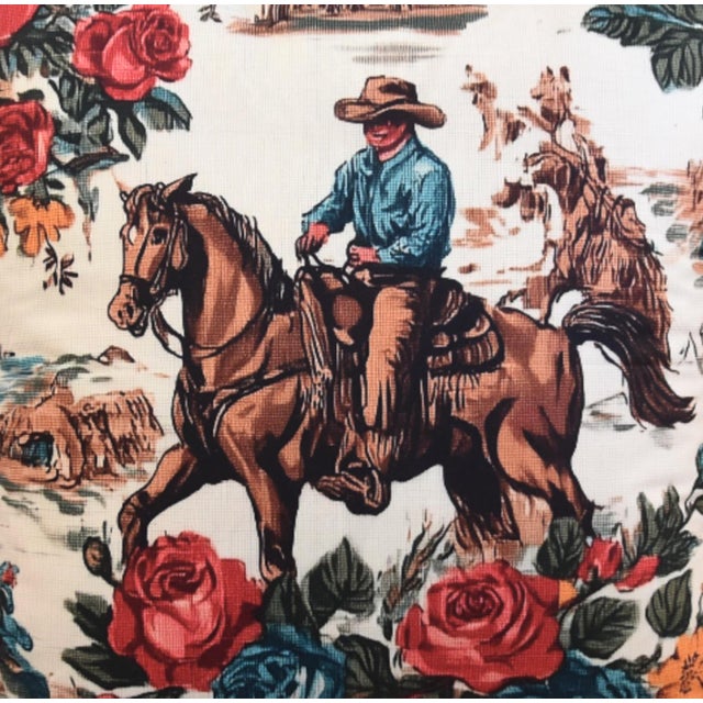 Beautiful vintage-style western cowboy pillow featuring a detailed rodeo graphic print of a cowboy riding a galloping...