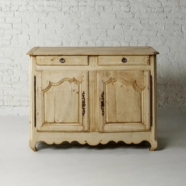 A quietly distinguished 19th century Belgian oak two-door dresser, offering the timeless combination of elegant form and...