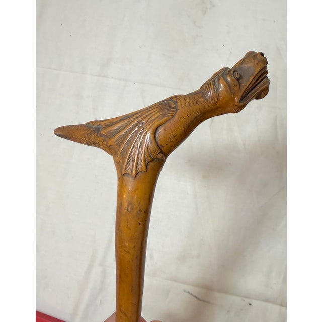 This antique 19th century hand carved Folk Art figural walking stick cane is a unique and original piece of antique décor....