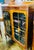 An Art Deco two door bookcase, with two mullioned doors opening to adjustable shelves, 52"h x 35"w x 10.5"d