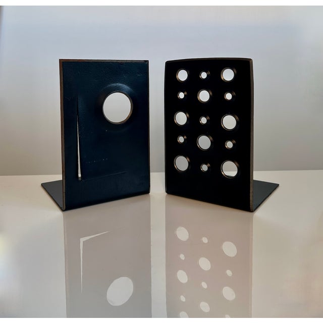 This pair of high quality bookends in cut steel was handcrafted by an unknown artist in Germany during the early 1950s....
